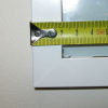 Picture of the curved edge of a fixed unit of secondary glazing.